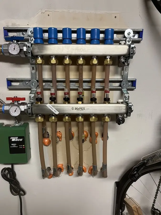 Plumber performing Water Heater Repair at a residential property in South Windsor